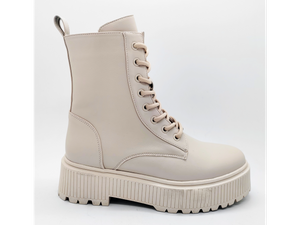 Botas femininas bege com design vanguardista e sola alta